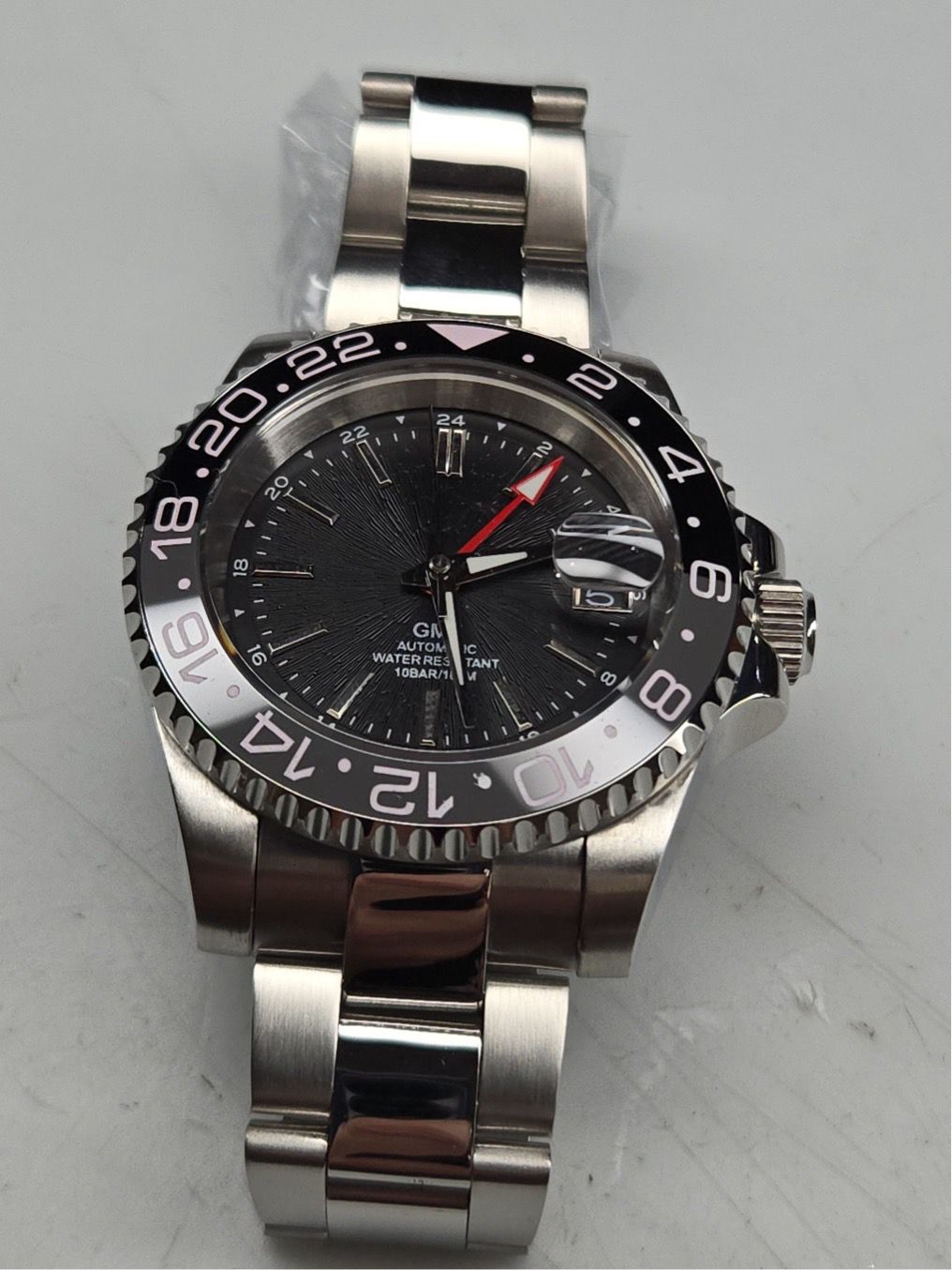 Custom GMT dive watch with black ceramic bezel